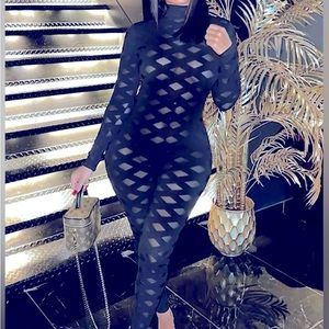 SEE RIGHT THROUGH JUMPSUIT